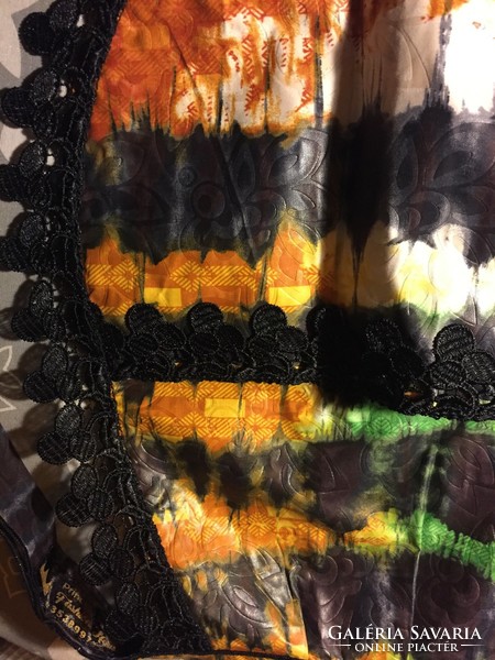Colorful African apron trimmed with black lace