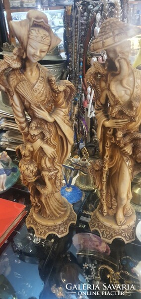 Far Eastern ceramic statues, also in pairs, 42 cm high