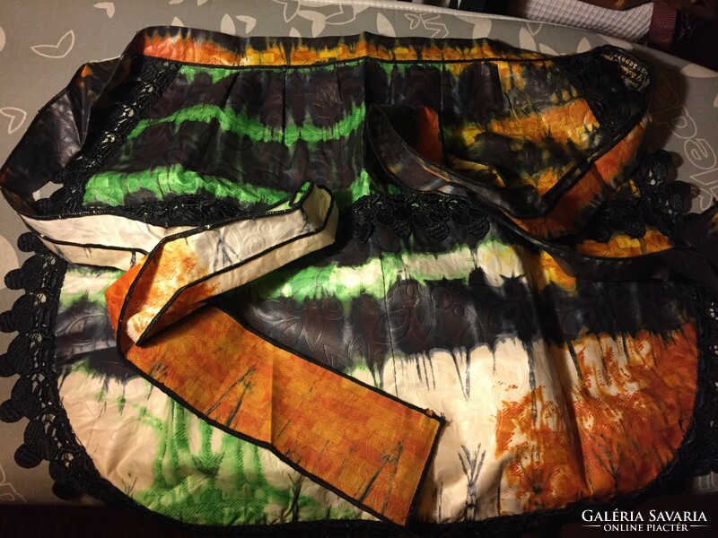 Colorful African apron trimmed with black lace