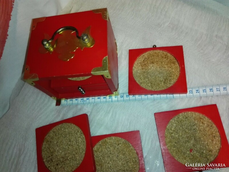 8 cork coasters in a copper-plated wooden box.
