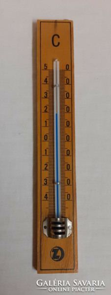 Old marked wooden wall thermometer