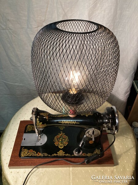 Design table lamp made from an old sewing machine.