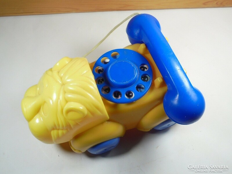 Retro colorful plastic toy dial landline telephone lion rolling figure