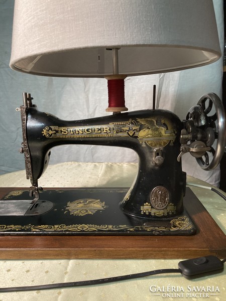 Design table lamp made from a Singer sewing machine.