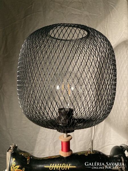 Design table lamp made from an old sewing machine.