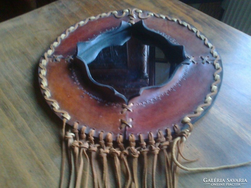 Handcrafted decorative wall mirror with leather frame - from the early 70s