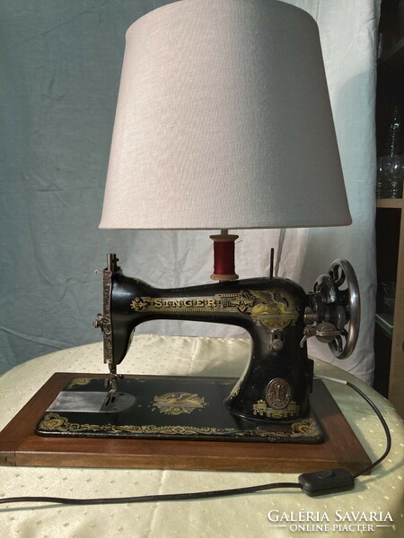 Design table lamp made from a Singer sewing machine.