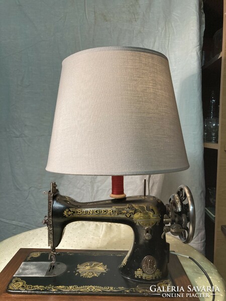 Design table lamp made from a Singer sewing machine.