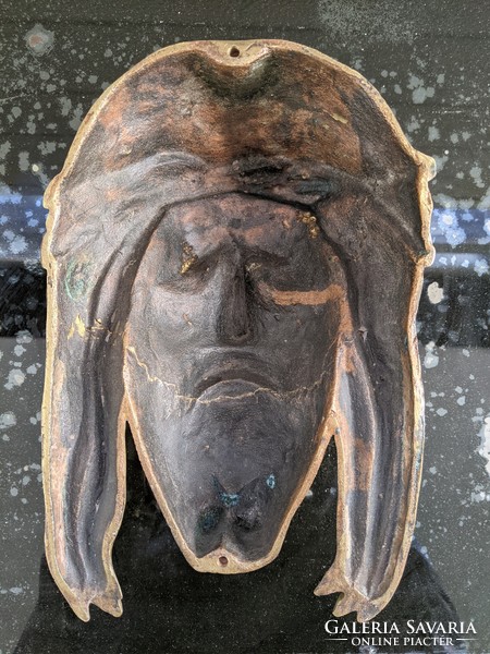 Cast copper Christ face
