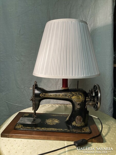 Design table lamp made from a Singer sewing machine.