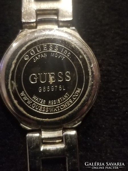 Vintage guess women's watch with gold tone dial and Japan movement
