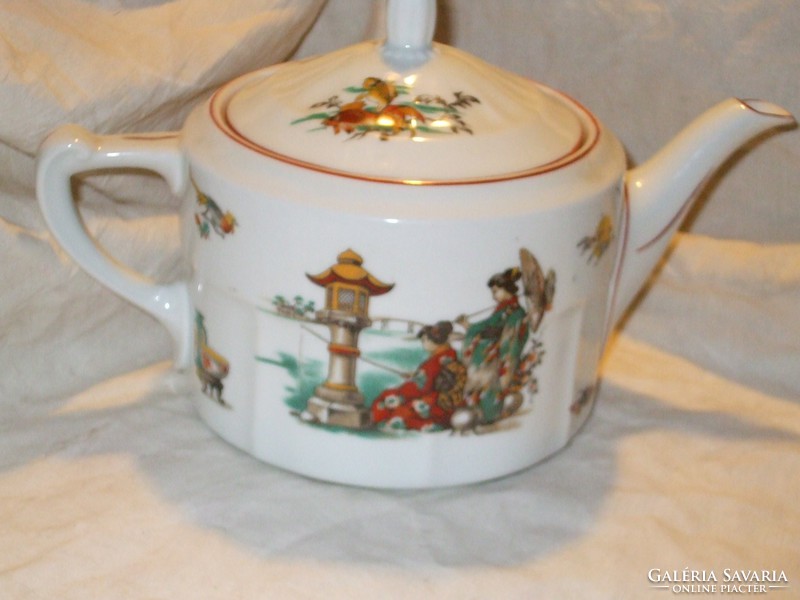 A beautiful hand-painted teapot with Japanese figures.E