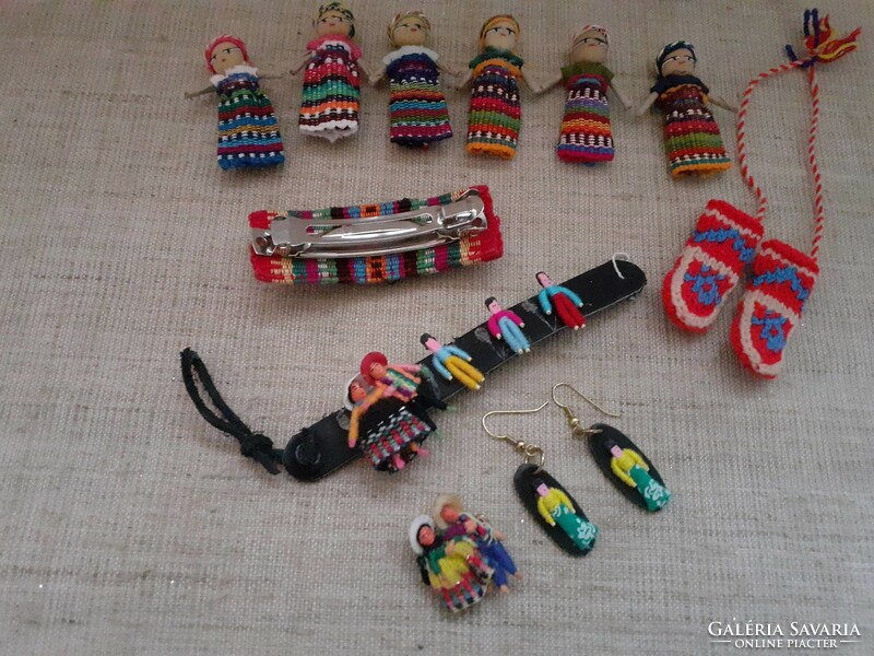 Handcrafted bracelets, earrings, hairpins and small dolls are sold together in their own holders