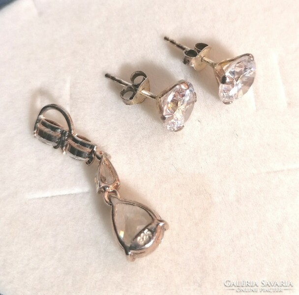 For sale marked silver earrings and pendant with real zirconia stones, sparklingly shiny