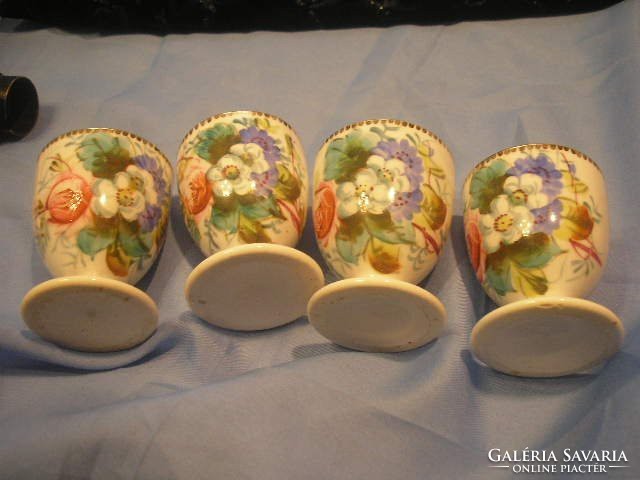 N15 gold-edged egg holders with a bright floral pattern, in good condition, 4 pieces only in one