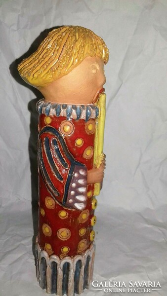 Rare retro ceramic figurine of bod éva playing the flute in a larger size