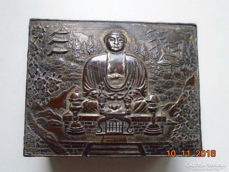 Antique silver-plated box with meditating Buddha, pagoda landscape, and bamboo with a Japanese relief pattern
