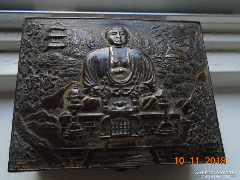 Antique silver-plated box with meditating Buddha, pagoda landscape, and bamboo with a Japanese relief pattern