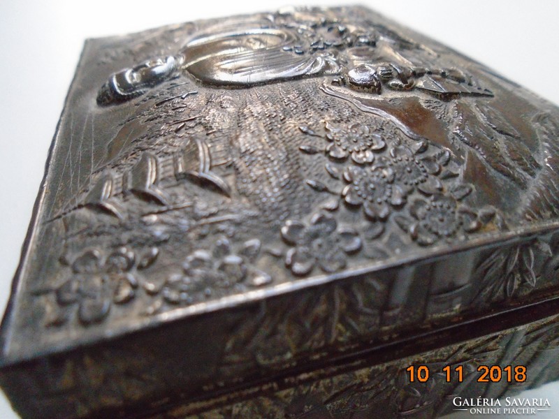 Antique silver-plated box with meditating Buddha, pagoda landscape, and bamboo with a Japanese relief pattern