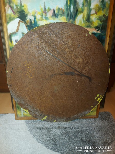 54 cm diameter, thick, circular iron plate, cut around with a flame cutter, several kilos