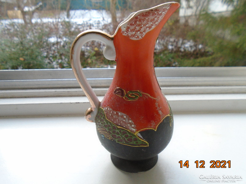 Satsuma moriage (embossed enamel) pitcher with Japanese Buddhist goddess of mercy