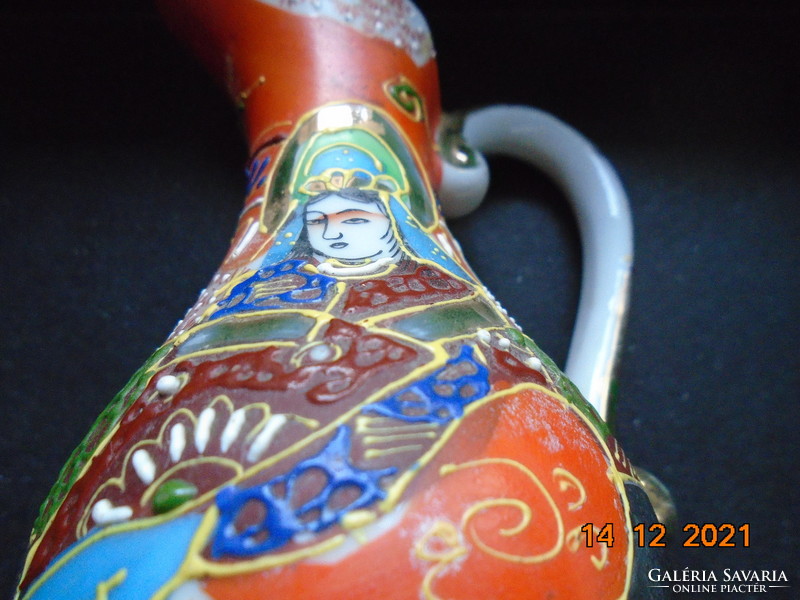 Satsuma moriage (embossed enamel) pitcher with Japanese Buddhist goddess of mercy