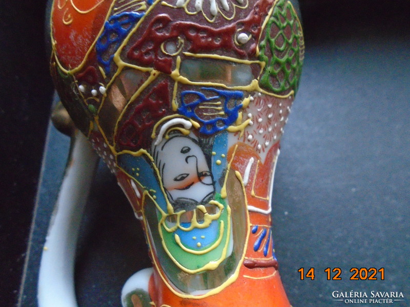 Satsuma moriage (embossed enamel) pitcher with Japanese Buddhist goddess of mercy