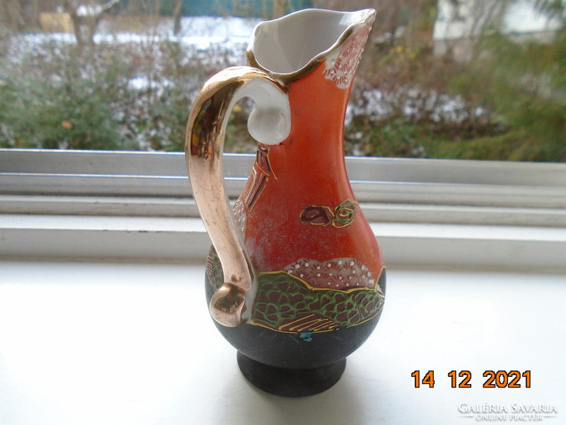 Satsuma moriage (embossed enamel) pitcher with Japanese Buddhist goddess of mercy