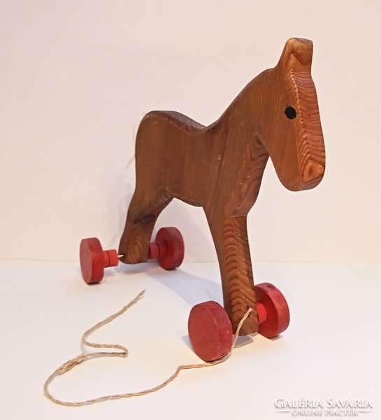 Old rolling wooden horse children's toy 22x24cm