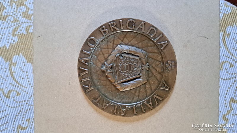 The company's excellent brigade copper commemorative plaque.