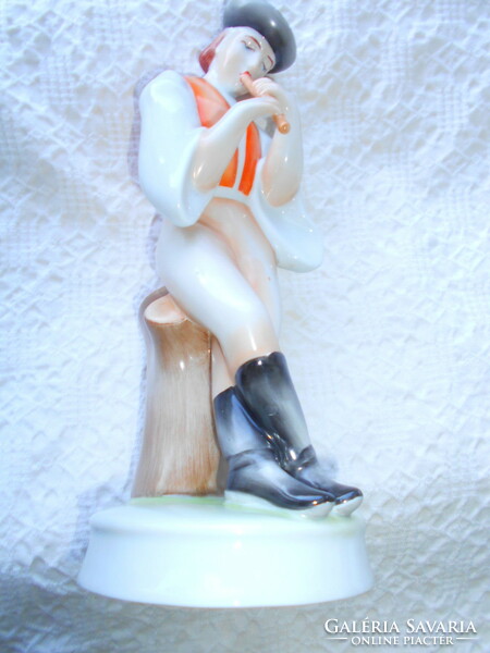 Porcelain figure of Zsolnay playing the flute