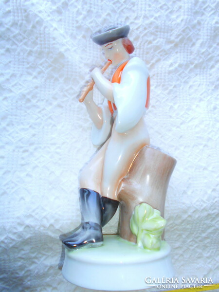 Porcelain figure of Zsolnay playing the flute