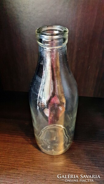 Old retro milk bottle. 26.5 cm high.