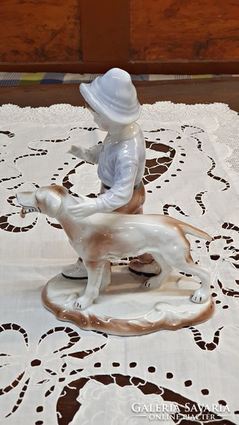 Old, Romanian, crown regent, fine porcelain figure. Boy with dog nip.