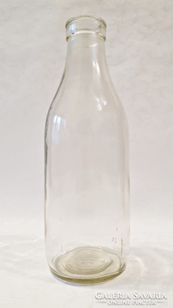 Old retro milk bottle. 26.5 cm high.