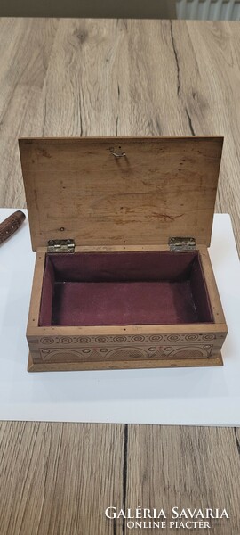 Antique wooden cigarette box with snuff.