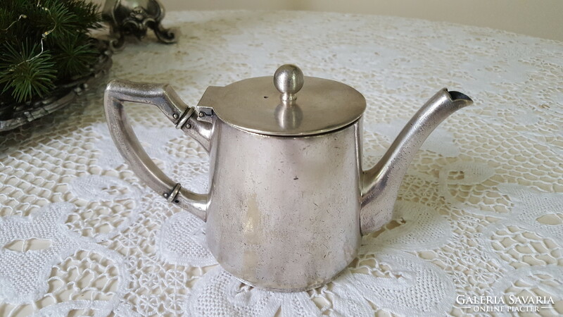 Old, silver-plated hotel coffee and tea pot, jug