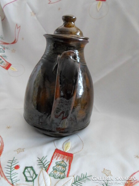 Folk handicraft glazed ceramic teapot