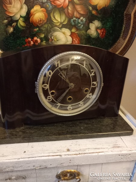 Old, musical fireplace clock, in need of repair