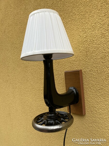 Design wall lamp made of sewing machine.