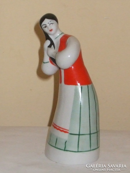 Russian porcelain combing woman.