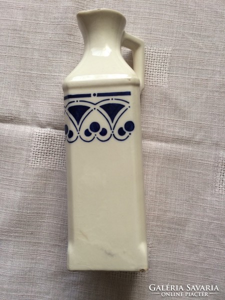 Antique earthenware vinegar container with handle