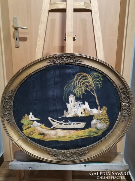 Picture embroidered on silk in a large oval carved frame