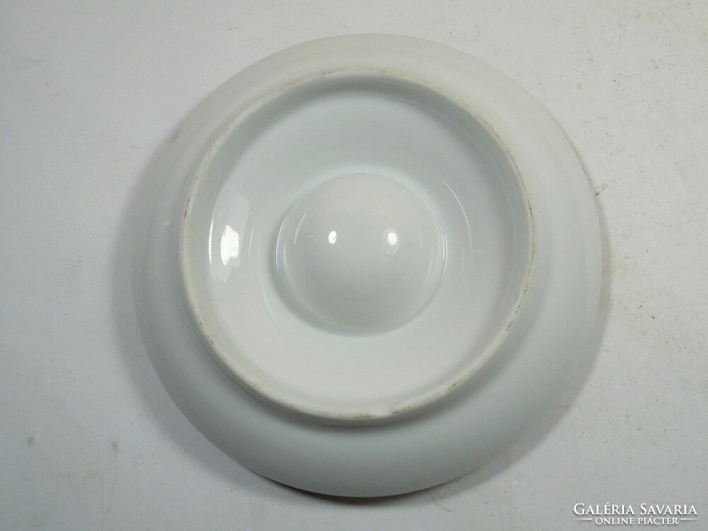 Old retro flower-patterned porcelain small plate for serving boiled eggs
