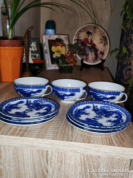 Porcelain tea cups and saucers