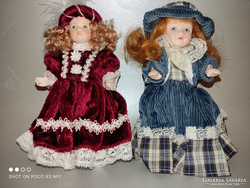 Porcelain smaller doll doll house dolls in new condition, two pieces together flawless