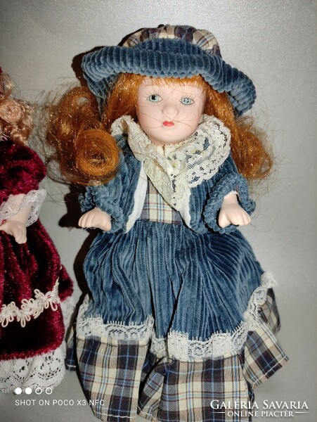 Porcelain smaller doll doll house dolls in new condition, two pieces together flawless
