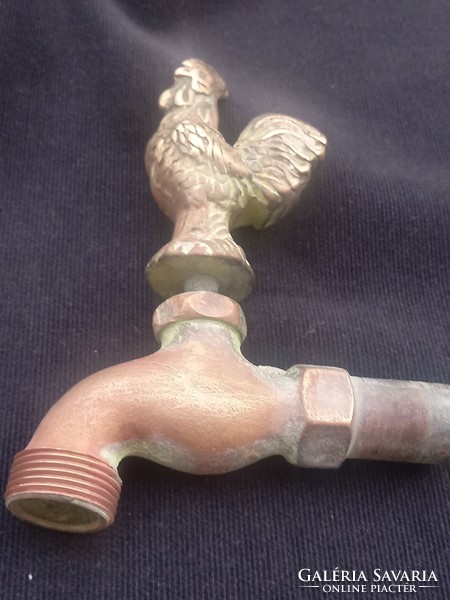 Old, folk, rustic, cock-shaped, solid copper tap