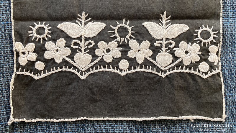 Black and white embroidered placemat