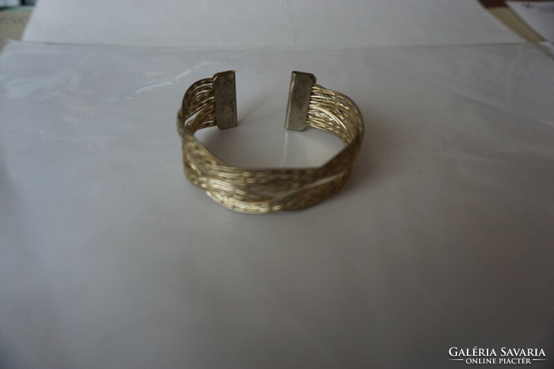 Braided and worked bronze flexible bracelet for sale.